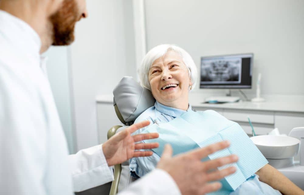 Elderly woman dental appointment.